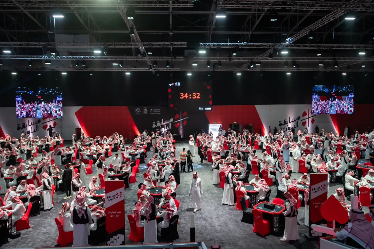 مسابقة البلوت - الصورة من حساب تقويم الرياض على تويتر