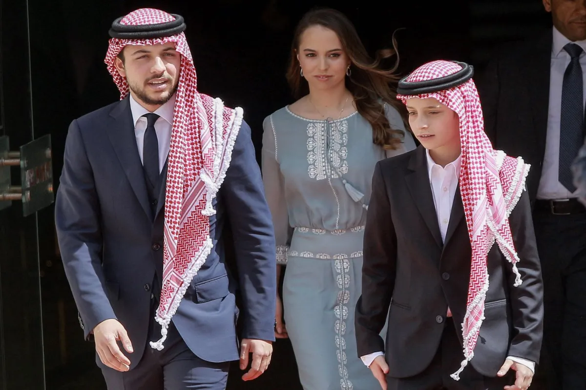 Crown Prince Hussein, his sister Princess Salma and younger brother Prince Hashem in Amman on May 25, 2019. Khalil MAZRAAWI / AFP