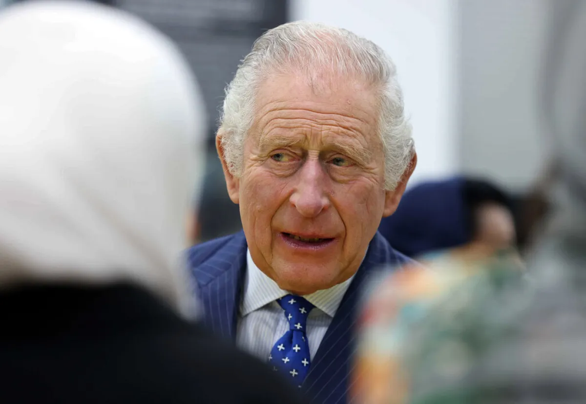 King Charles III reacts as he meets with members of the Sudanese community from across the United Kingdom, in London on March 15, 2023. Ian Vogler / POOL / AFP