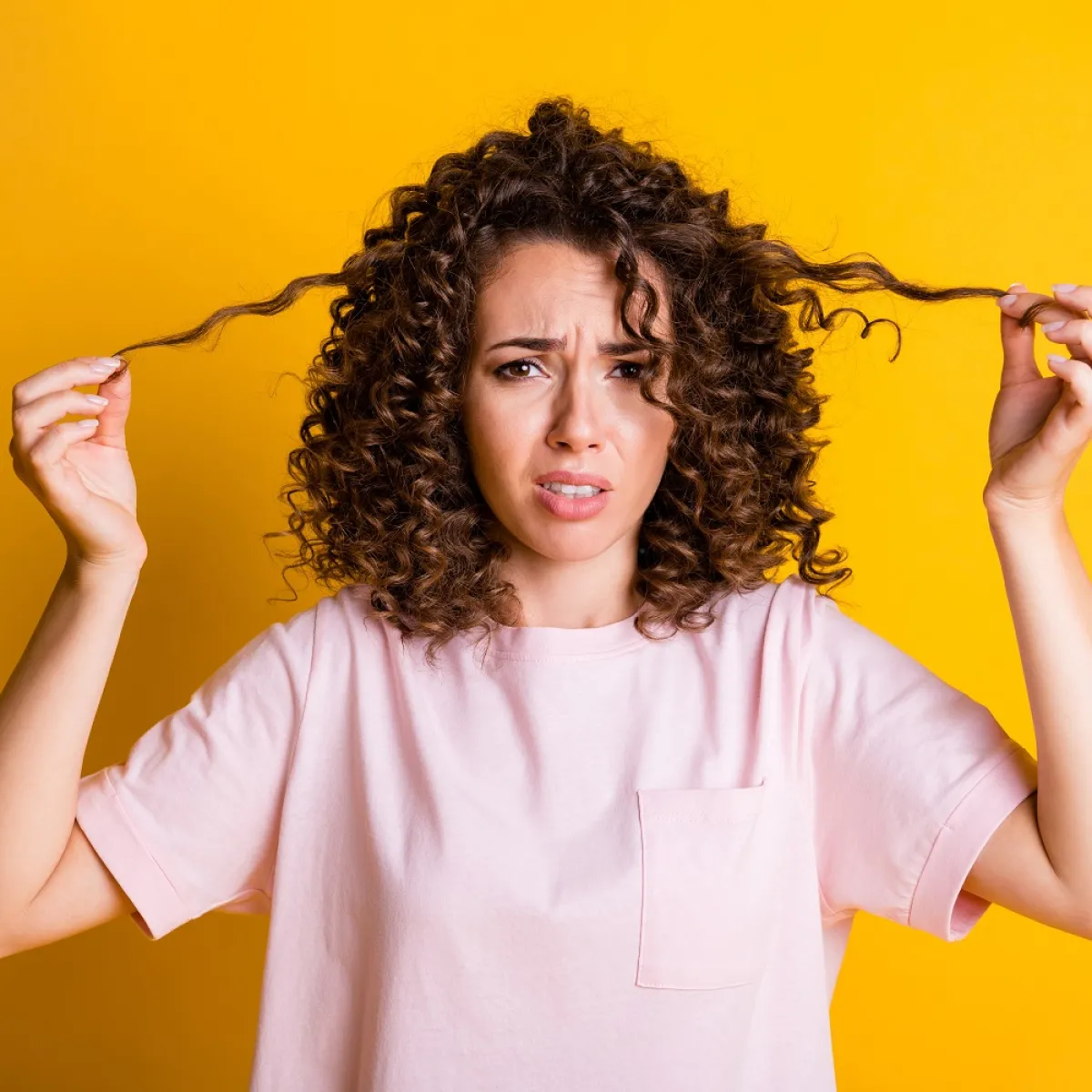 صورة شعر مموج مصنوع بالكي الساخن