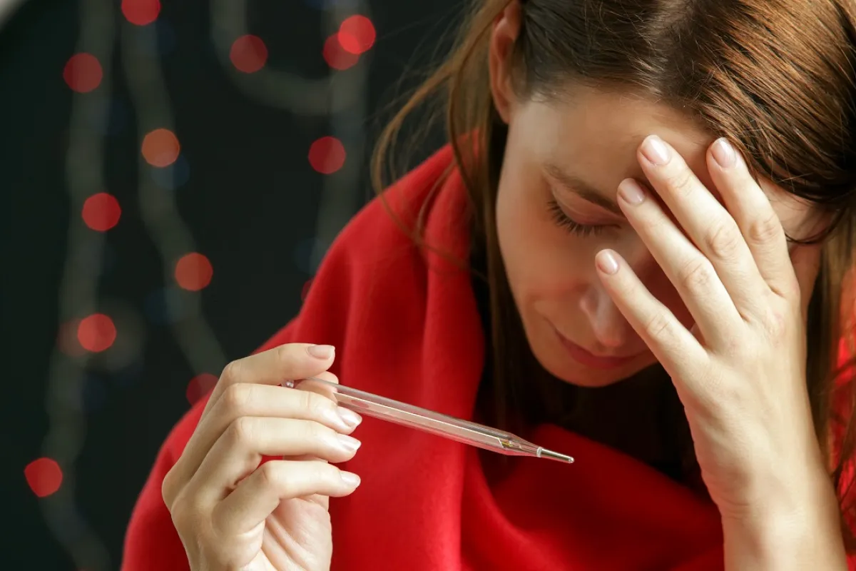 صورة لحامل تقيس درجة حرارتها