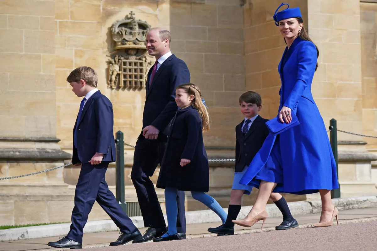 Prince William, Prince George,  Catherine, Princess Charlotte  and  Prince Louis at St. George's Chapel, Windsor Castle on April 9, 2023. Yui Mok / POOL / AFP