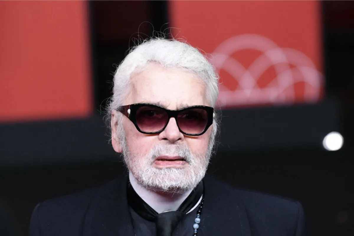 Karl Lagerfeld looks on after launching the Champs Elysees Christmas lights, on November 22, in Paris. ALAIN JOCARD / AFP