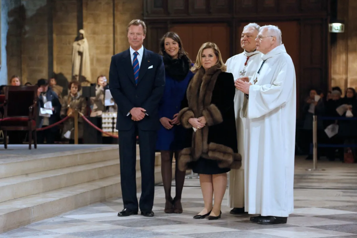 The Grand-Duke Henri of Luxembourg (L), his wife Grand-Duchess Maria Teresa (R), and their daughter Princess Alexandra (C) on February 2, 2013 in Paris. AFP PHOTO / FRANCOIS GUILLOT