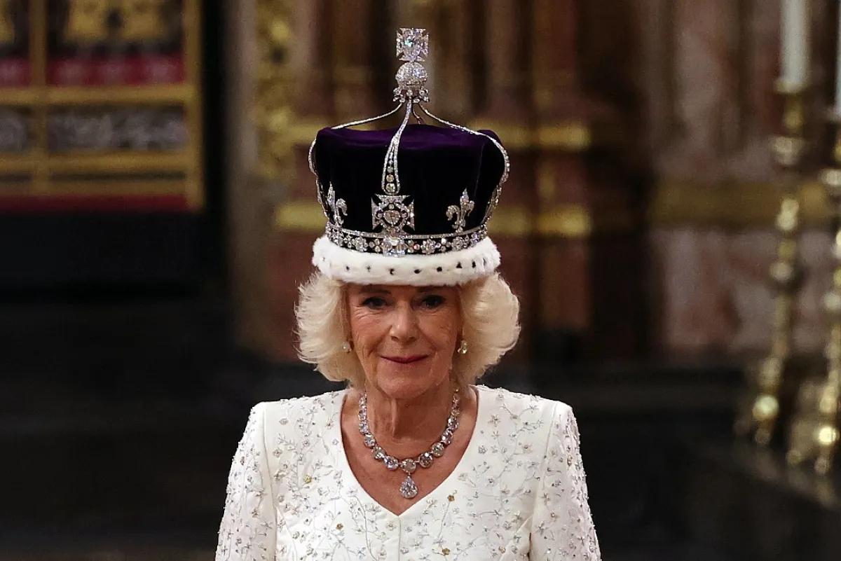 Britain's Camilla walks wearing a modified version of Queen Mary's Crown during the Coronation Ceremony inside Westminster Abbey in central London, on May 6, 2023.. Richard POHLE / POOL / AFP