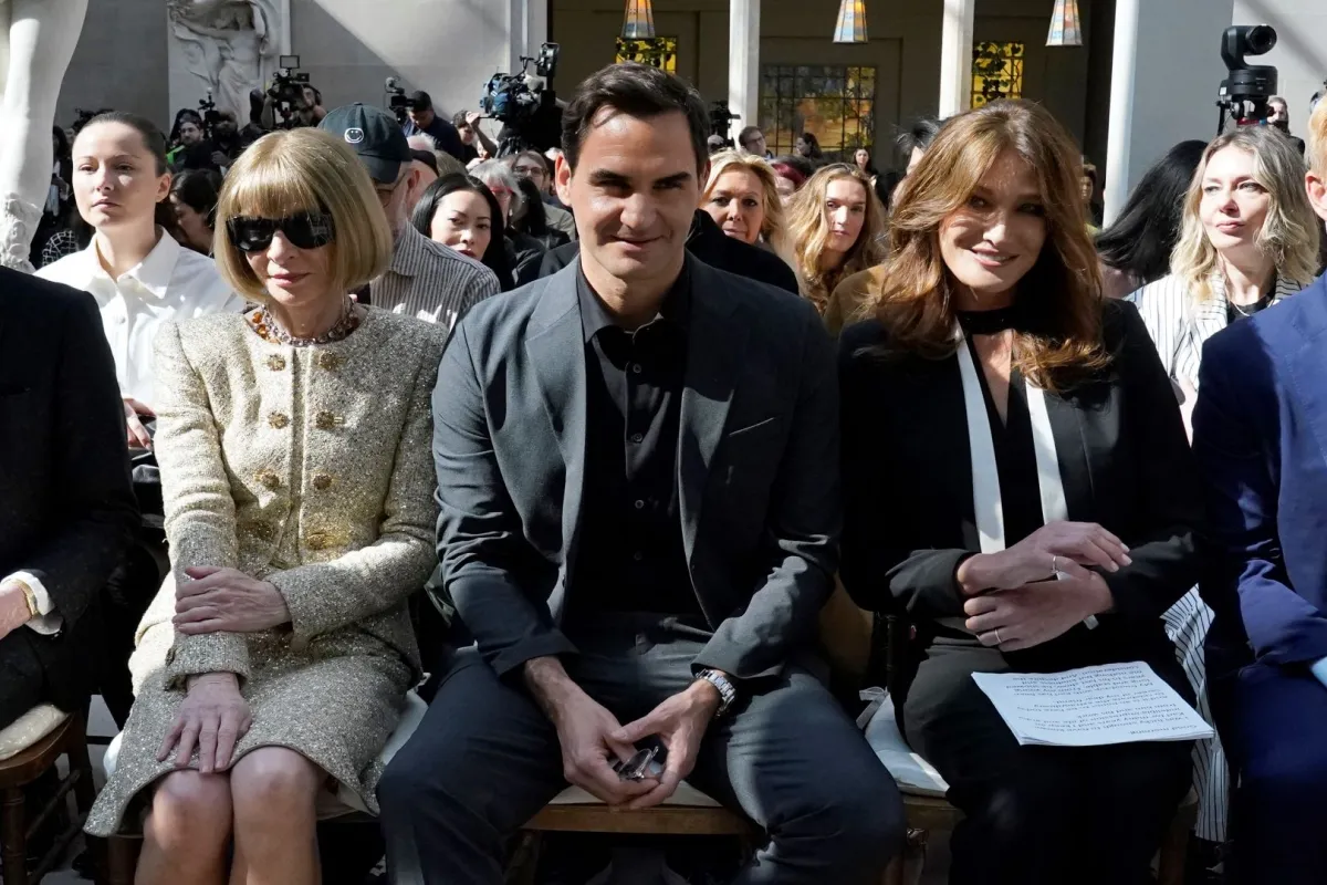 Anna Wintour, Roger Federer, and French singer and model Carla Bruni  at The Metropolitan Museum of Art in New York City on May 1, 2023. TIMOTHY A. CLARY / AFP