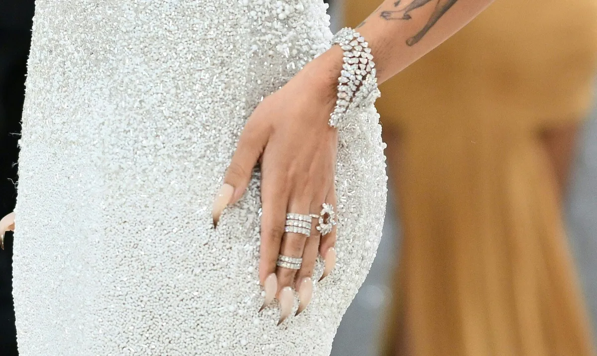  Doja Cat (detail nails) arrives for the 2023 Met Gala at the Metropolitan Museum of Art on May 1, 2023, in New York. The Gala raises money for the Metropolitan Museum of Art's Costume Institute. The Gala's 2023 theme is “Karl Lagerfeld: A Line of Beauty.” Angela WEISS / AFP