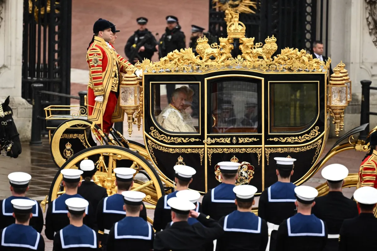 Britain's King Charles III and Britain's Camilla in the 'King's Procession', a journey of two kilometres from Buckingham Palace to Westminster Abbey in central London on May 6, 2023, ahead of their coronations. Marco BERTORELLO / AFP