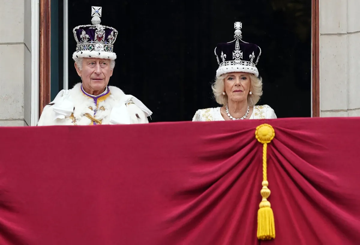 King Charles III (L) and Queen Camilla appear on the Buckingham Palace balcony, in London, following their coronations, on May 6, 2023. Stefan Rousseau / POOL / AFP