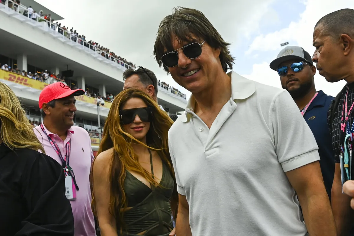Tom Cruise (R) and Colombian singer Shakira (L) attend the 2023 Miami Formula One Grand Prix at the Miami International Autodrome in Miami Gardens, Florida, on May 7, 2023. (Photo by CHANDAN KHANNA / AFP)