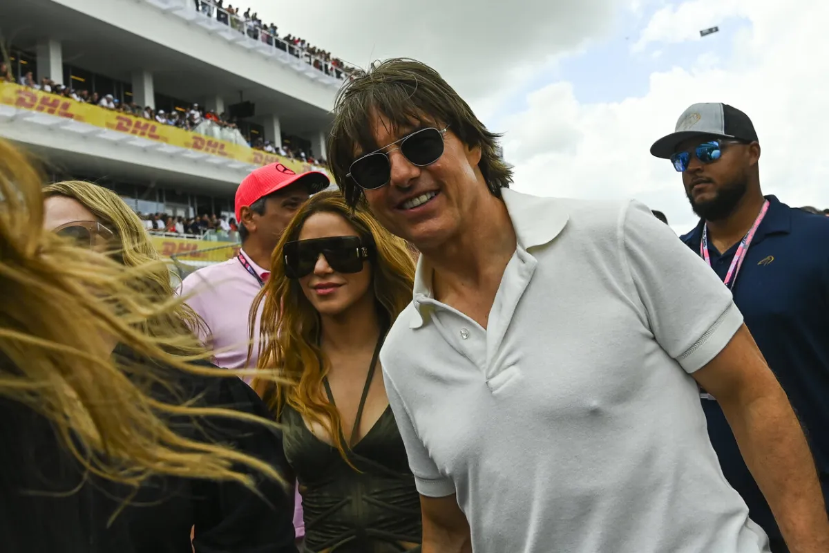 Tom Cruise (R) and Colombian singer Shakira (L) attend the 2023 Miami Formula One Grand Prix at the Miami International Autodrome in Miami Gardens, Florida, on May 7, 2023. (Photo by CHANDAN KHANNA / AFP)