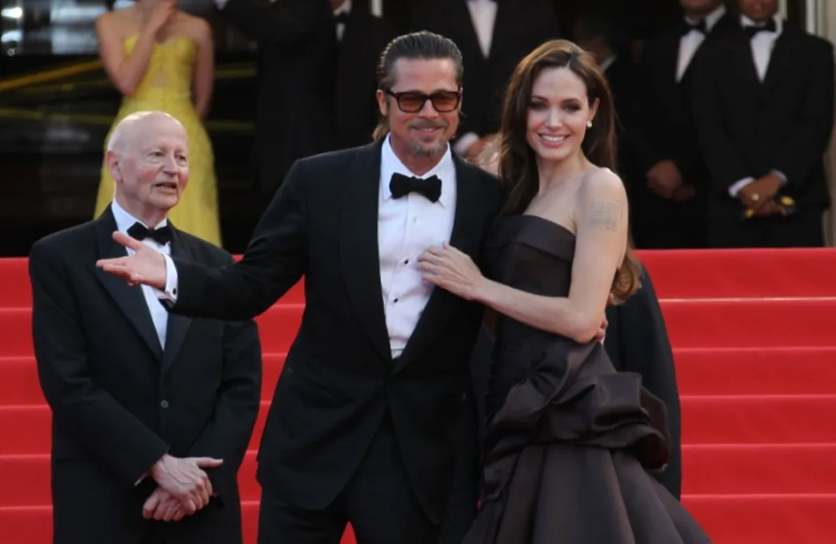 Brad Pitt and Angelina Jolie at the 64th Cannes Film Festival on May 16, 2011 in Cannes. AFP PHOTO / VALERY HACHE (Photo by VALERY HACHE / AFP)