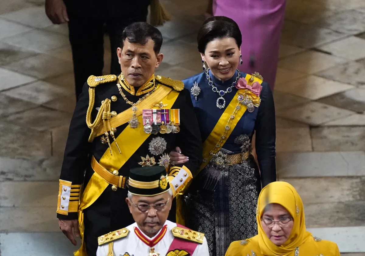 King Vajiralongkorn and Queen Suthida of Thailand arrive at Westminster Abbey in central London on May 6, 2023, ahead of the coronations of Britain's King Charles III and Britain's Camilla, Queen Consort.Andrew Matthews / POOL / AFP