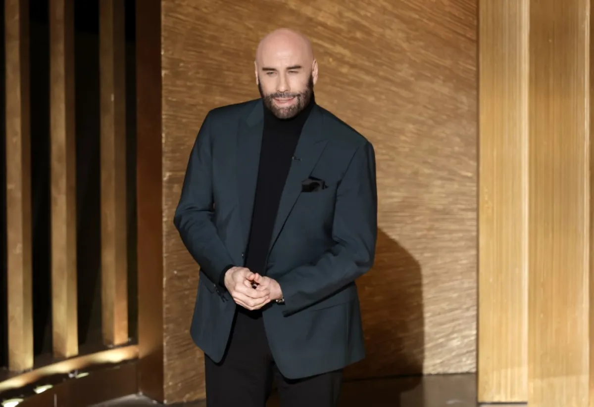 John Travolta speaks onstage during the 95th Annual Academy Awards at Dolby Theatre on March 12, 2023 in Hollywood, California. Kevin Winter/Getty Images/AFP