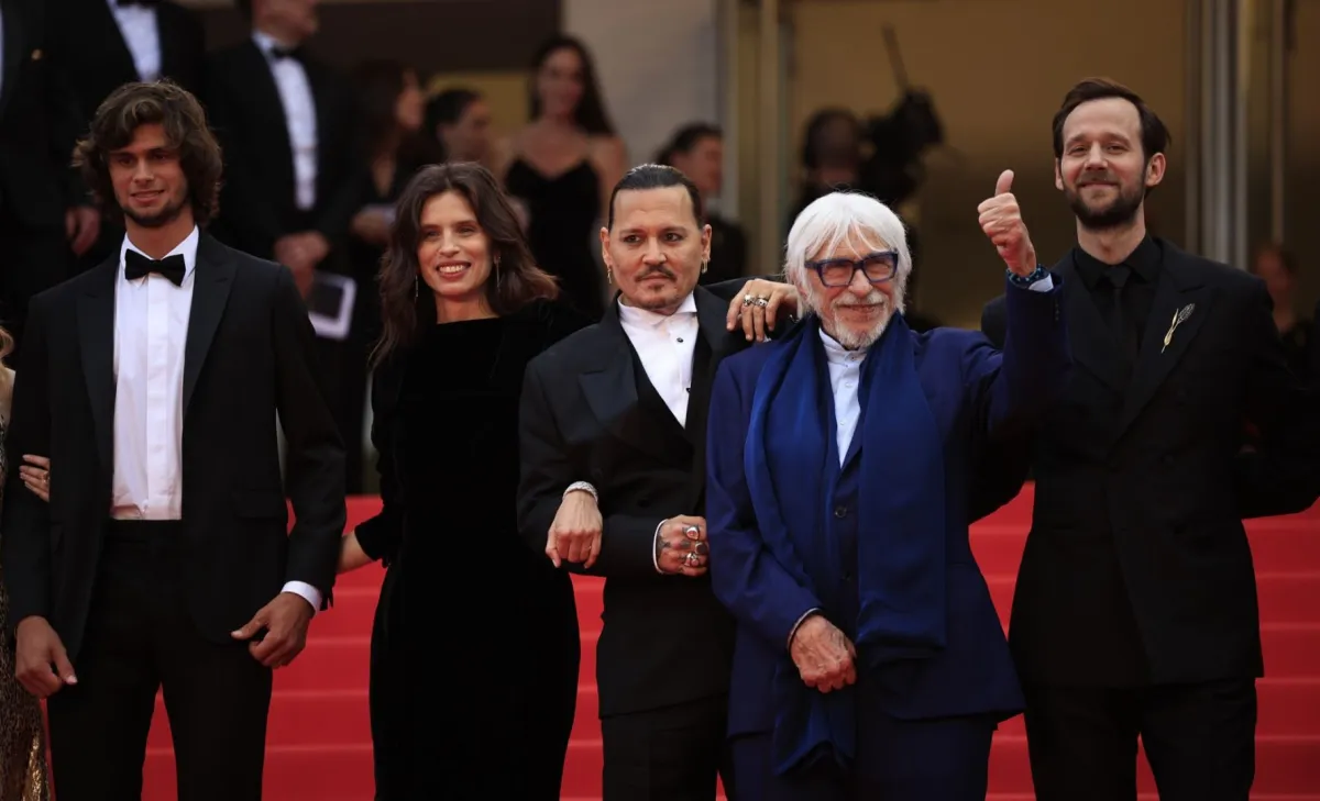 French actor Diego Le Fur, French actress and director Maiwenn, US actor Johnny Depp, French actor Pierre Richard and French actor Benjamin Lavernhe in Cannes, southern France, on May 16, 2023. (Photo by Valery HACHE / AFP)