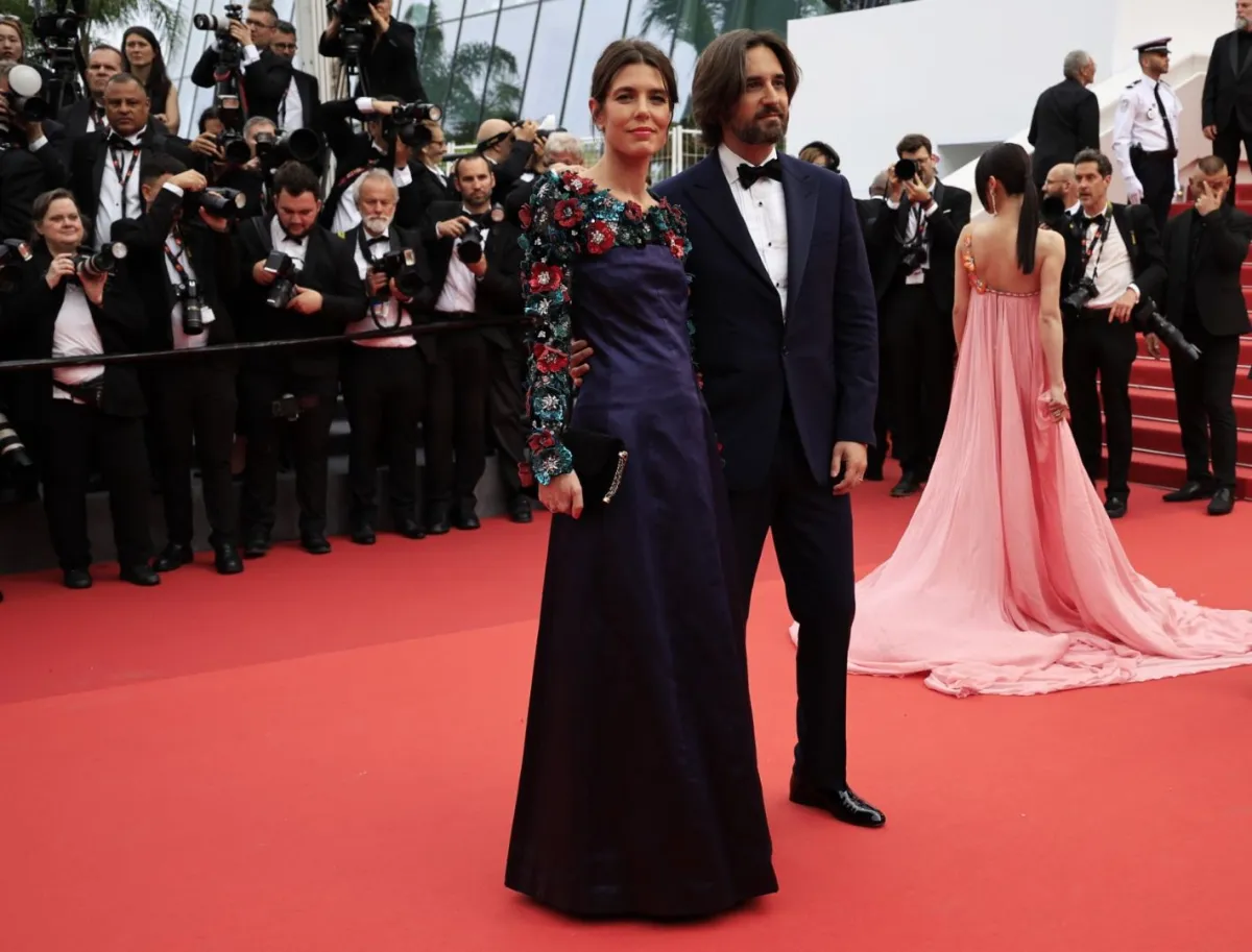 Charlotte Casiraghi (L) and French producer Dimitri Rassam in Cannes, southern France, on May 16, 2023. (Photo by Valery HACHE / AFP)