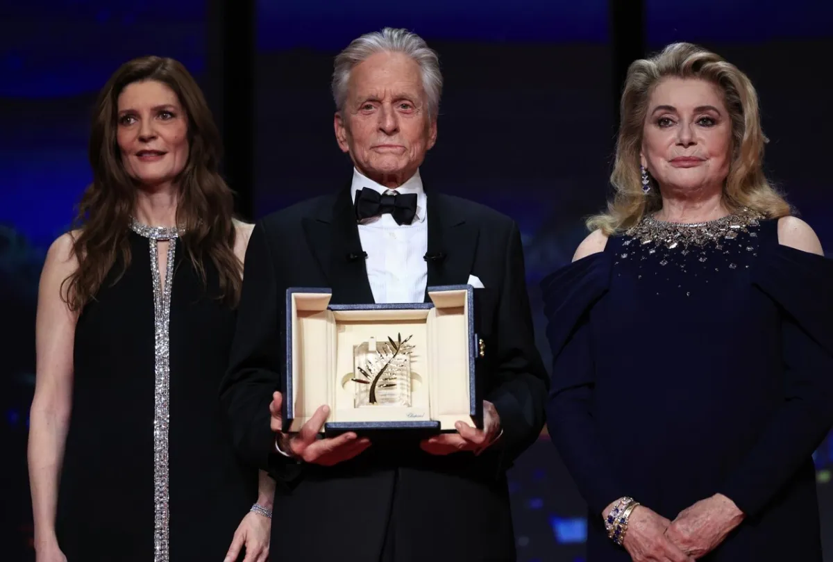 rench actress and Mistress of Ceremony of the 76th edition of the Cannes Film Festival Chiara Mastroianni, US actor Michael Douglas and French actress Catherine Deneuve stand during the opening ceremony in Cannes, southern France, on May 16, 2023. (Photo by Valery HACHE / AFP)