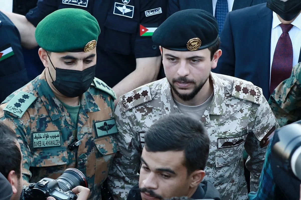 Crown Prince Hussein bin Abdulla in Amman's Sweileh district on December 19, 2022. (Photo by Khalil MAZRAAWI / AFP)