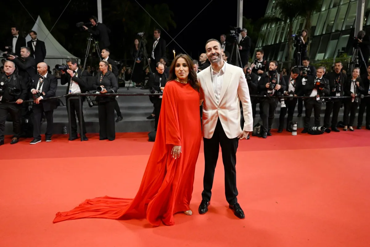 جمانا الراشد Jomana Alrashid ومحمد التركي Mohammed Al Turki في مهرجان كان السينمائي 2023 (مصدر الصورة: Gareth Cattermole/Getty Images)