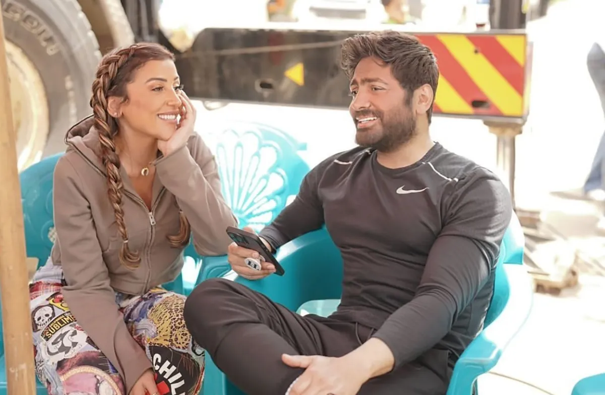 تامر حسني ودينا الشربيني في كواليس فيلم تاج - الصورة من صفحة تامر على إنستغرام