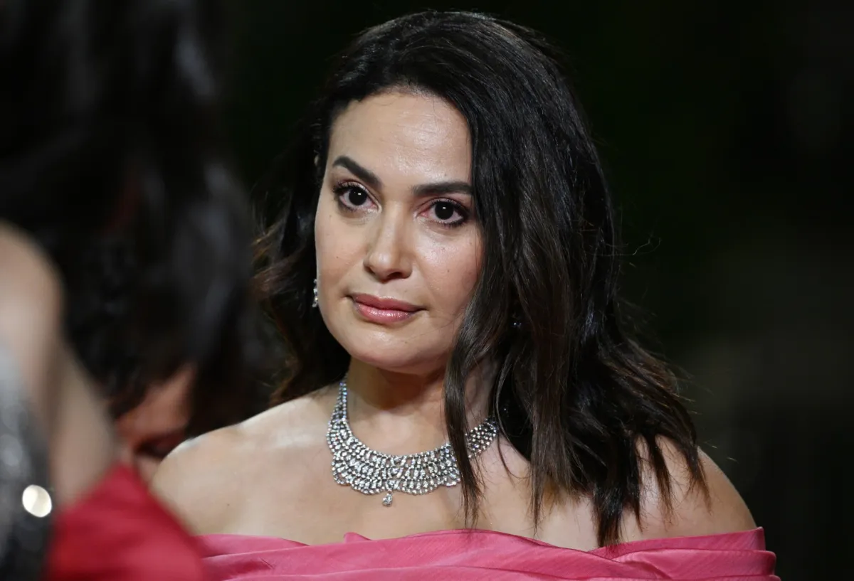 Tunisian actress Hend Sabri arrives for the screening of the film "Les Filles D’Olfa" (Four Daughters) during the 76th edition of the Cannes Film Festival in Cannes, southern France, on May 19, 2023. (Photo by Patricia DE MELO MOREIRA / AFP)