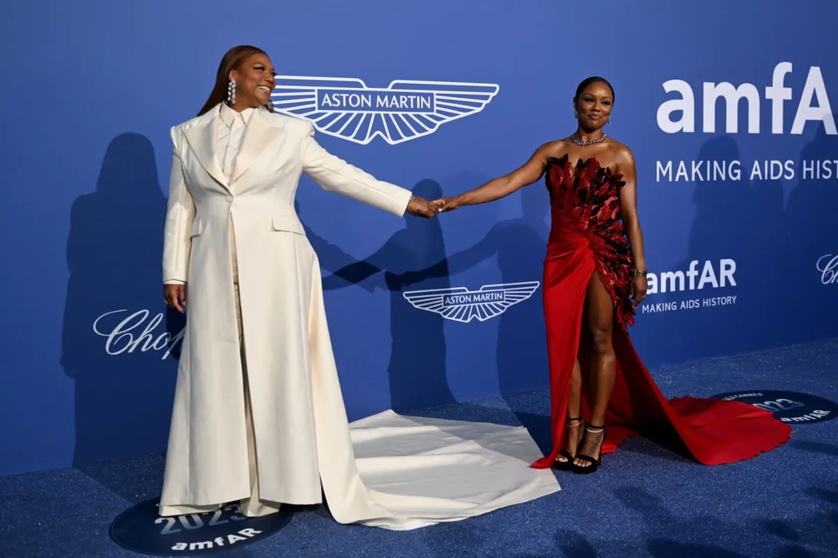 من حفل أمفار: من اليسار مغنية الراب الأمريكية كوين لطيفة (Queen Latifah) ومصممة الرقصات الأمريكية إيبوني نيكولز (Eboni Nichols). مصدر الصورة: Patricia DE MELO MOREIRA / AFP