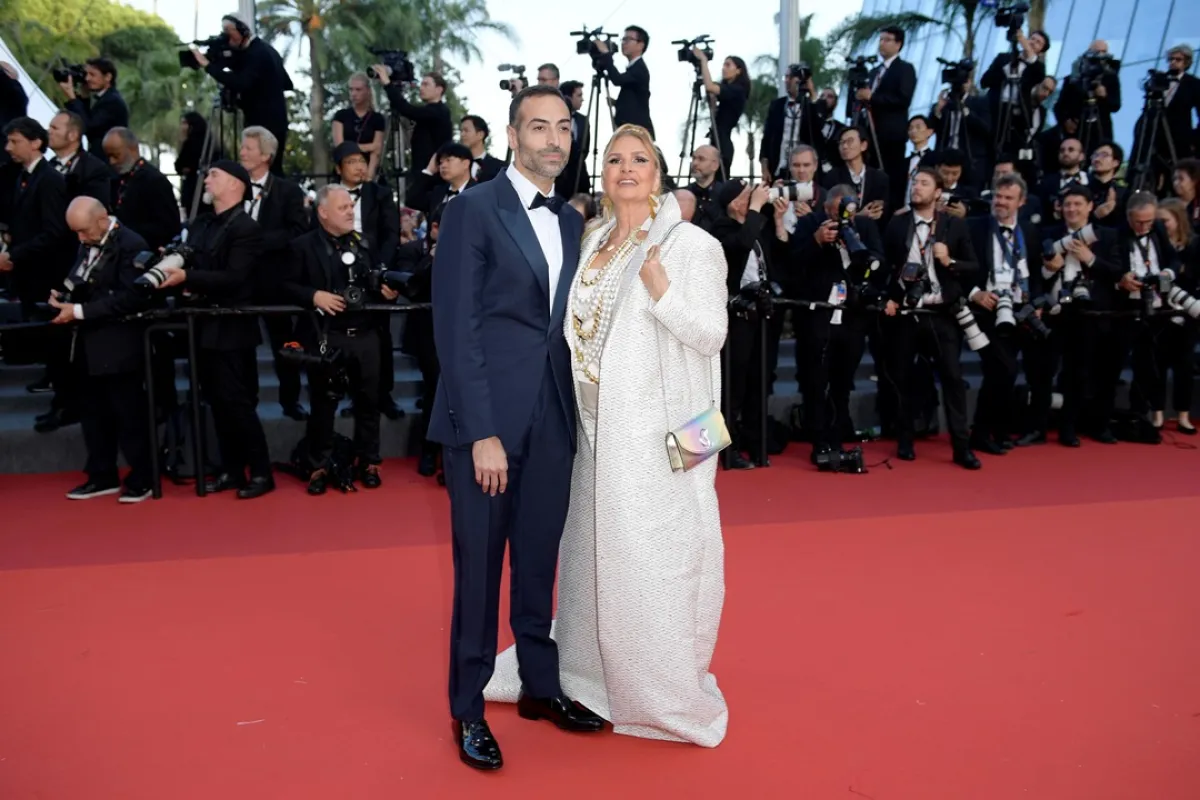 مهرجان كان السينمائي 2023 ،من اليسار الأستاذ محمد التركي ويسرا (مصدر الصورة : Kristy Sparow/Getty Images)
