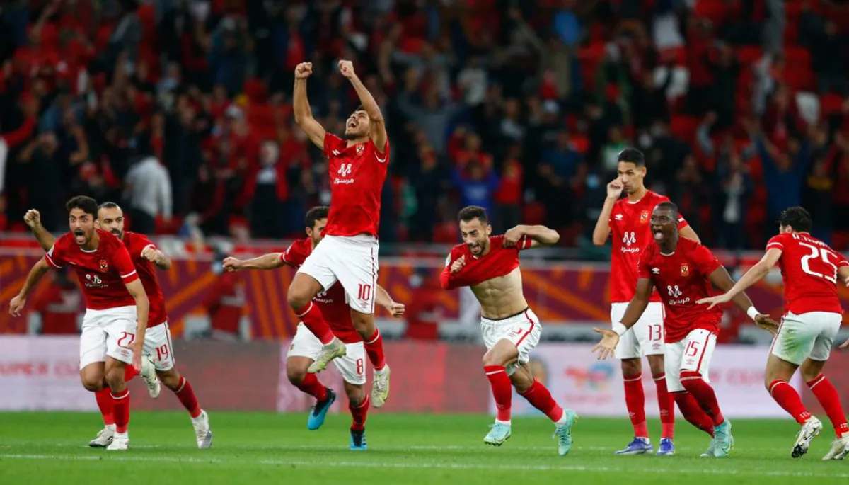 African Super Cup - Final - Al Ahly SC v Raja Casablanca - Ahmed bin Ali Stadium, Al Rayyan, Qatar - December 22, 2021 Al Ahly's Mohamed Sherif and teammates celebrate after winning the penalty shoot-out REUTERS/Amr Abdallah Dalsh