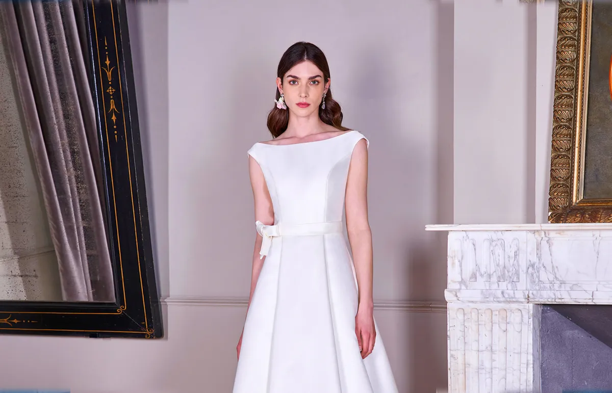 موديلات فساتين زفاف مع ياقة باتو لعروس 2023 من كارلو بيجناتيلي Carlo Pignatelli