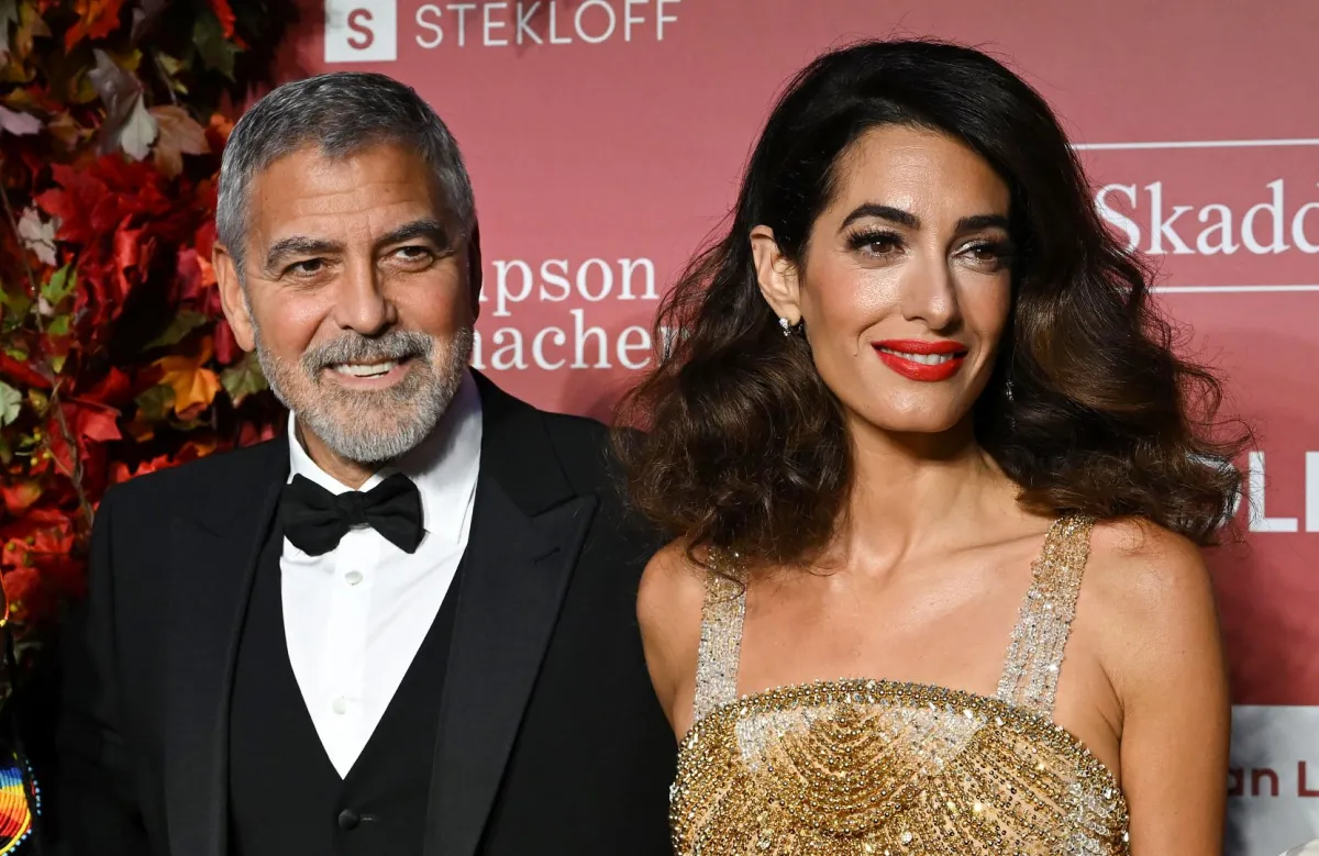 جورج كلوني وزوجته أمل علم الدين كلوني (George Clooney and his wife British-Lebanese lawyer Amal Alamuddin Clooney). مصدر الصورة: TIMOTHY A. CLARY / AFP