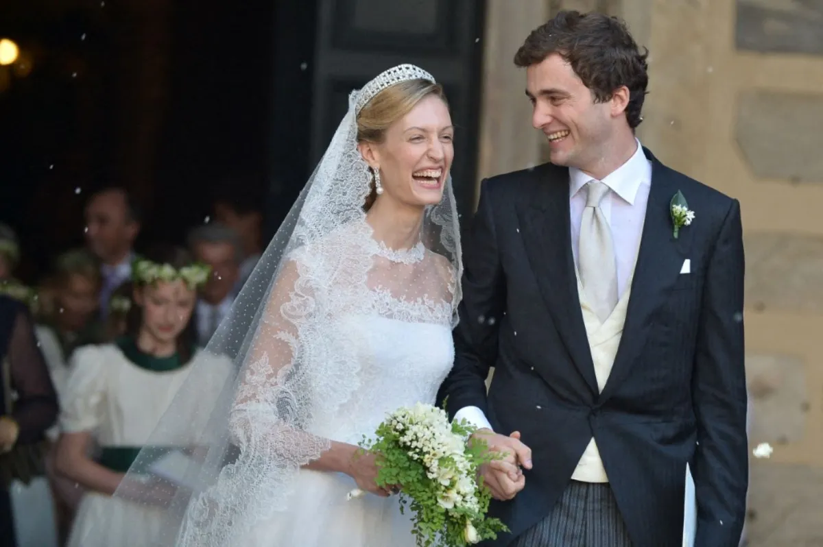 الأمير أميديو  والأميرة إليزابيتا (Prince Amedeo of Belgium and bride Elisabetta). مصدر الصورة: AFP PHOTO / TIZIANA FABI