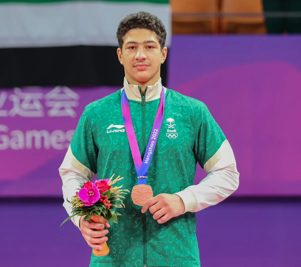 تتويج السعودي عمر ندا بالبرونزية في الجوجيتسو تحت الـ85 كجم في دورة الألعاب الآسيوية -  الصورة من حساب اللجنة الأولمبية والبارالمبية على إكس