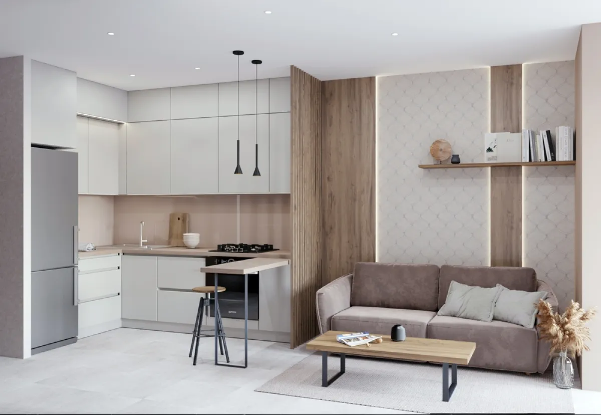 ألوان الديكور في منطقة المعيشة المفتوحة جنباتها على بعضها البعض أحادية، من بينها العاجي