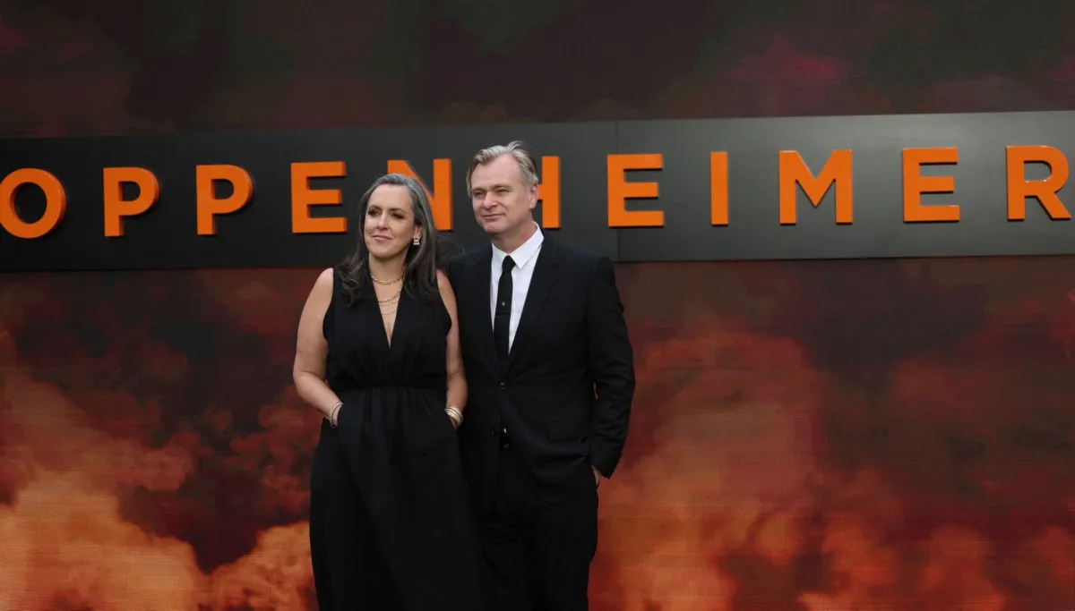 إيما توماس وزوجها كريستوفر نولان (Emma Thomas and her husband Christopher Nolan). مصدر الصورة: HENRY NICHOLLS / AFP