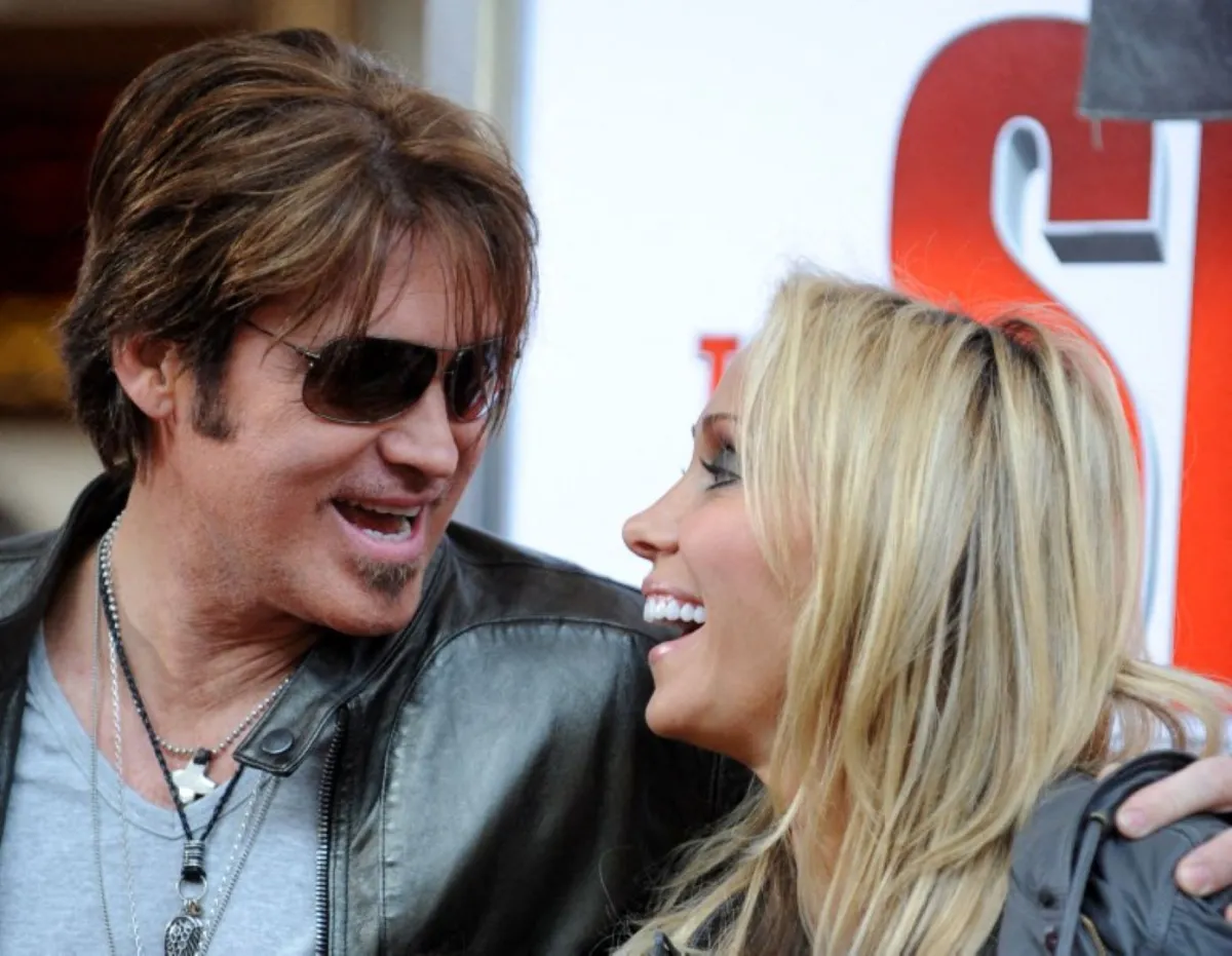 بيلي راي سايرس وتيش سايرس (Billy Ray Cyrus and Tish Cyrus). مصدر الصورة: Frazer Harrison/AFP