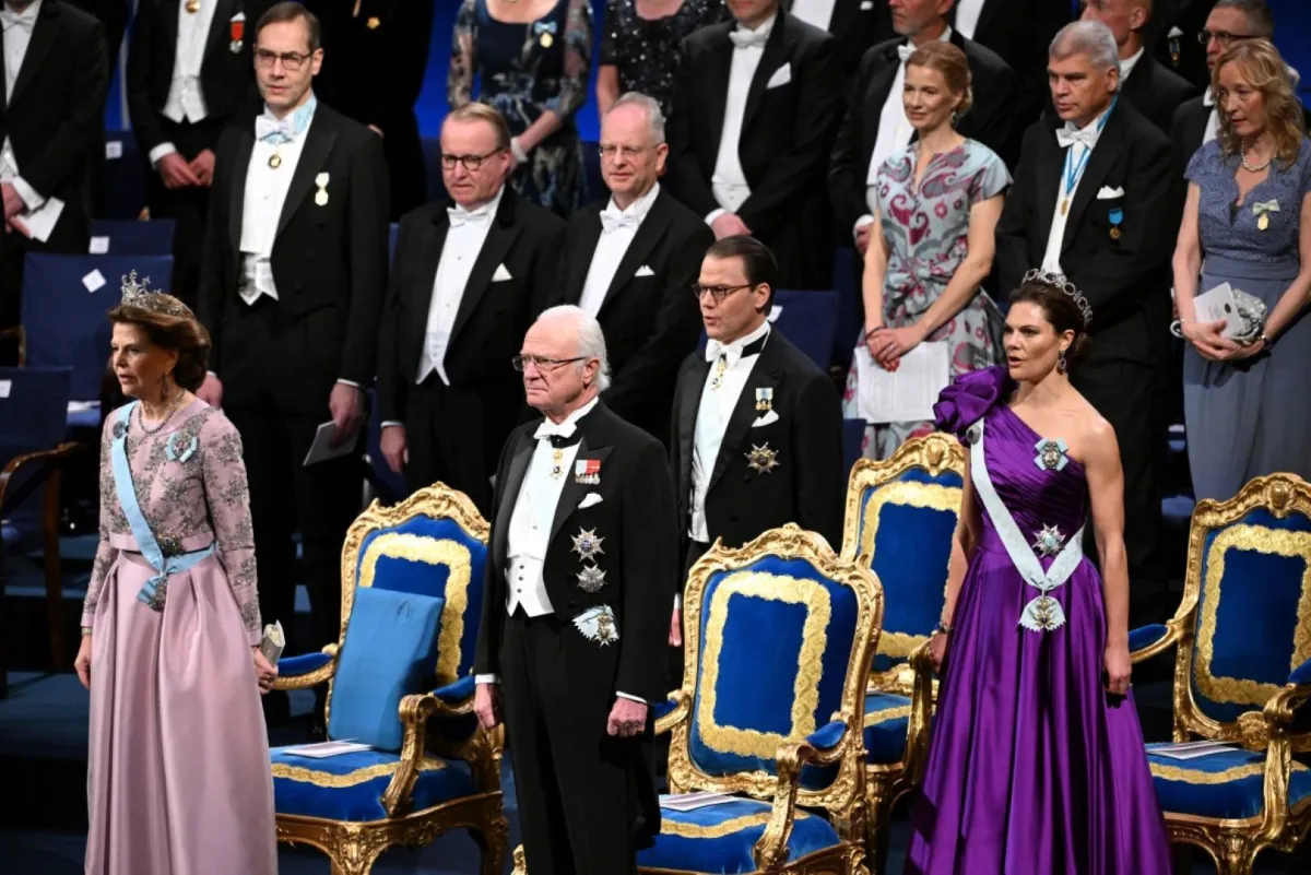 الملكة سيلفيا، الملك كارل السادس عشر غوستاف، الأمير دانيال، وولية العهد الأميرة فيكتوريا (Queen Silvia, King Carl XVI Gustaf, Prince Daniel and Crown Princess Victoria). مصدر الصورة: Jonathan NACKSTRAND / AFP