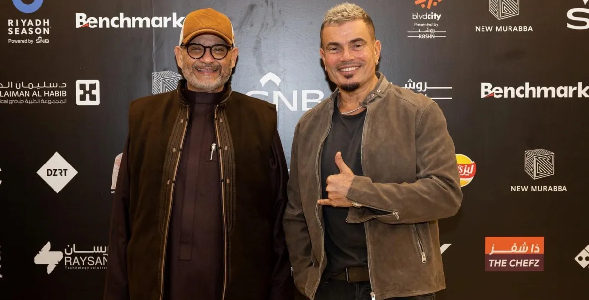 عمرو دياب وزكي حسنين رئيس مجلس ادارة مجموعة بنش مارك -الصورة من المركز الاعلامي ل بنش مارك