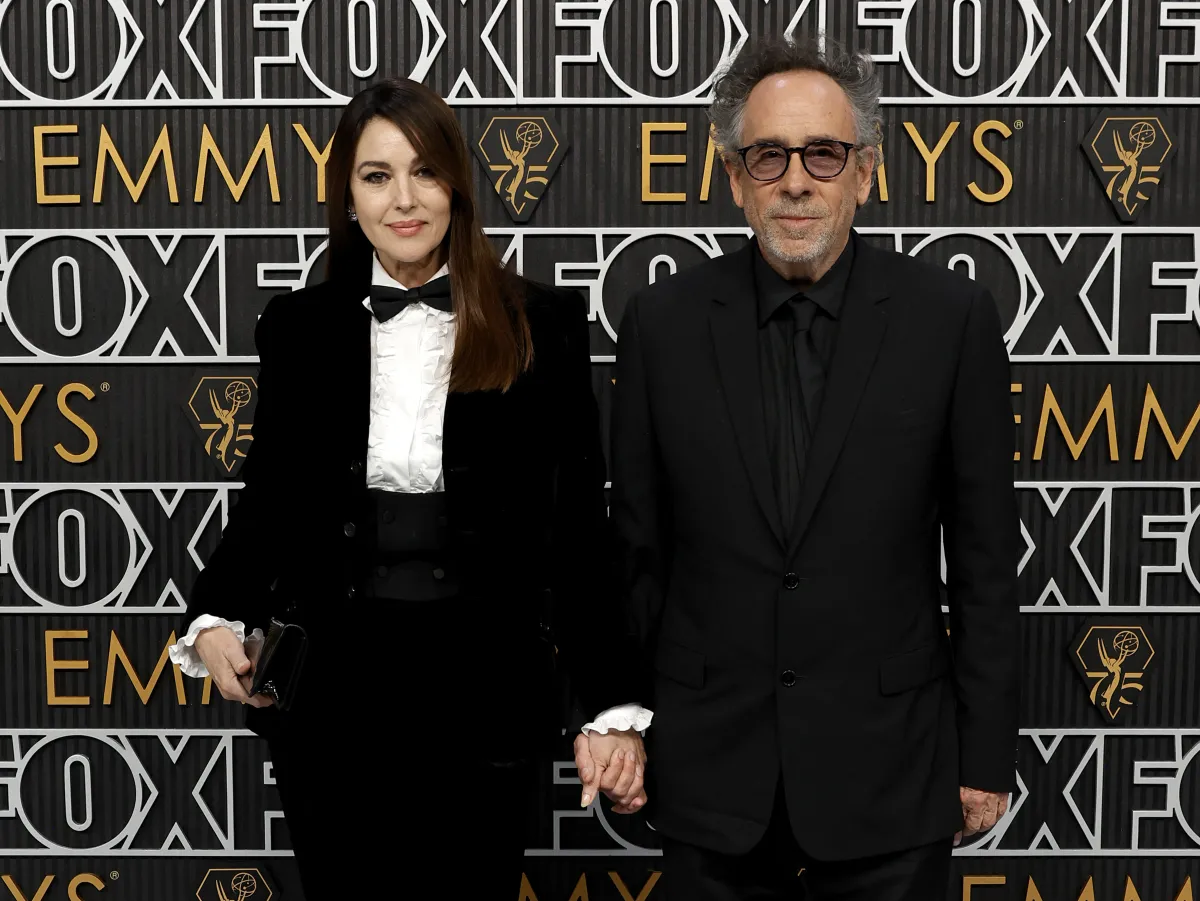 (L-R) Monica Bellucci and Tim Burton  Peacock Theater on January 15, 2024 in Los Angeles, California (Photo by Frazer Harrison / GETTY IMAGES NORTH AMERICA / Getty Images via AFP)