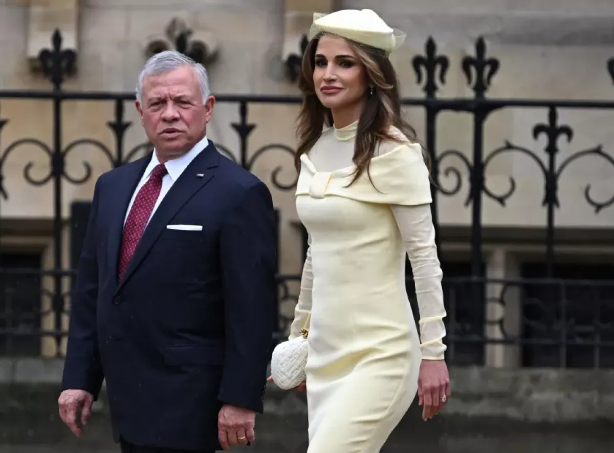 الملكة رانيا والملك عبدالله الثاني (King Abdullah II Ibn Al Hussein and Queen Rania).. مصدر الصورة: Paul ELLIS / AFP