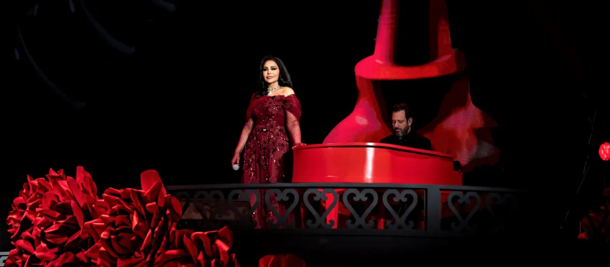 أحلام  وعازف البيانو العالمي-الصورة من المركز الاعلامي ل شركة بنش مارك