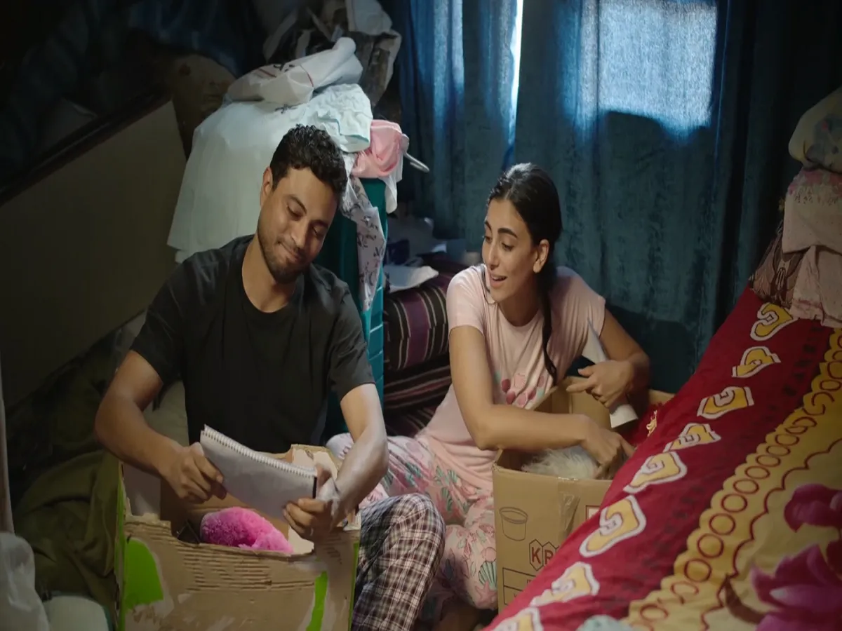 ولاء الشريف واحمد ماجد فى مشهد من نعمة الافوكاتو