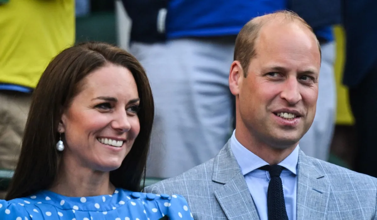 الأمير ويليام وكيت ميدلتون في نادي عموم إنجلترا للتنس في ويمبلدون، جنوب غرب لندن (Catherine and Prince William at The All England Tennis Club in Wimbledon, southwest London). مصدر الصورة: Glyn KIRK / AFP
