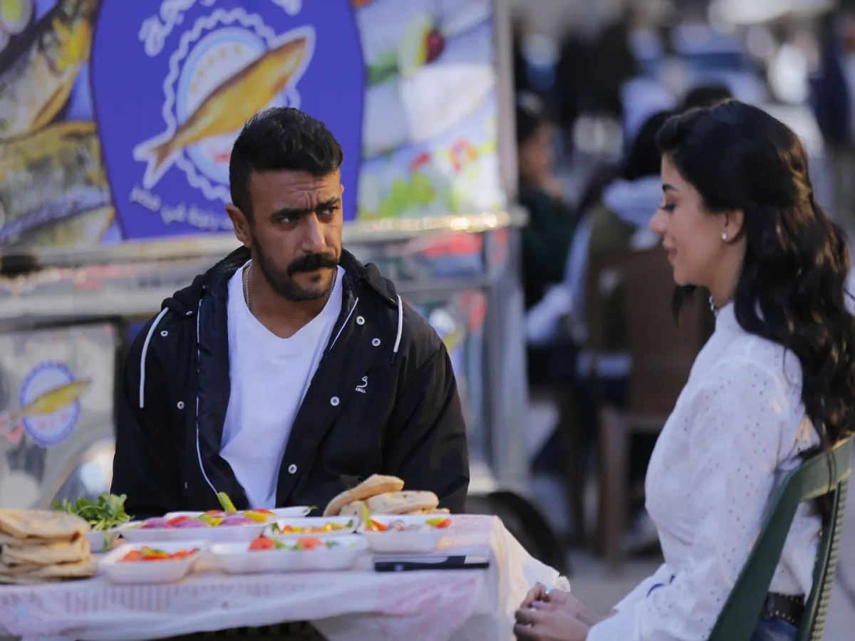 أحمد العوضى وكارولين عزمى