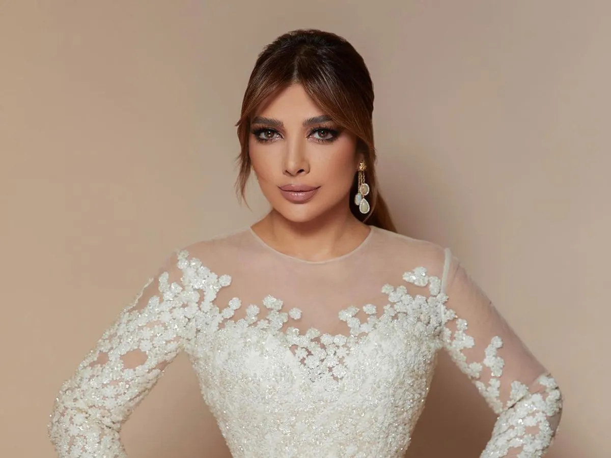 أصالة بفستان أبيض - الصورة من إنستغرام المصمم رامي العلي