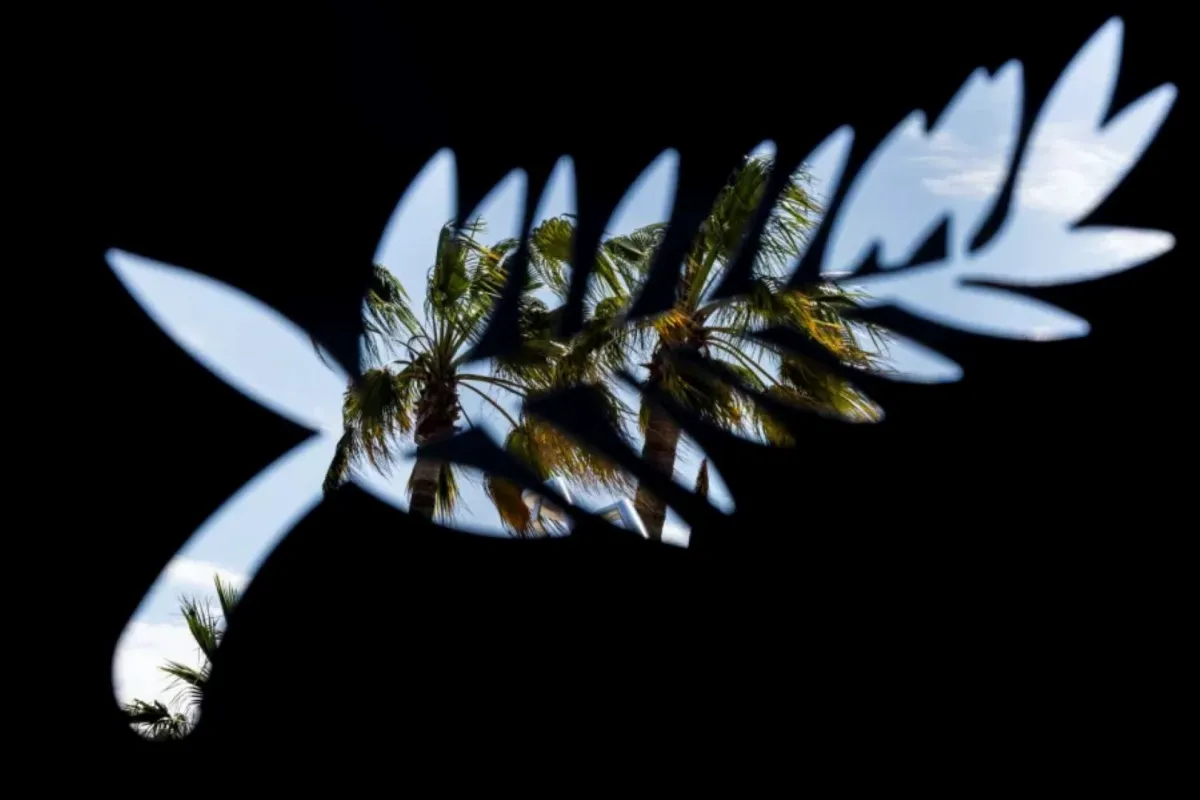 شجر النخيل شعار مهرجان كان السينمائي (palm trees, logo of the Cannes film festival). مصدر الصورة: Sameer Al-DOUMY / AFP