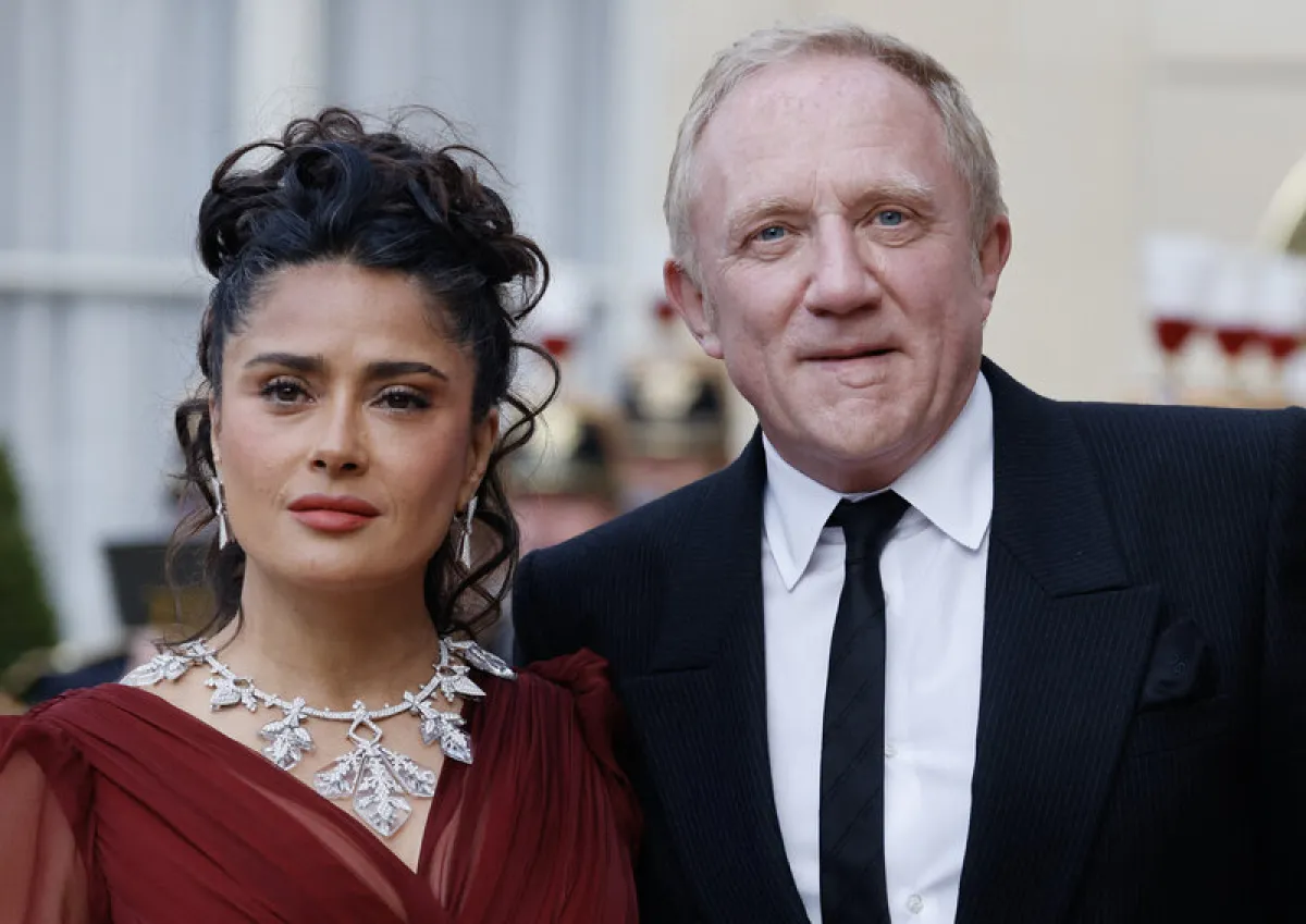 سلمى حايك وزوجها  فرانسوا هنري بينو خلال زيارة الرئيس الصيني لفرنسا (مصدر الصورة: Ludovic MARIN / AFP)