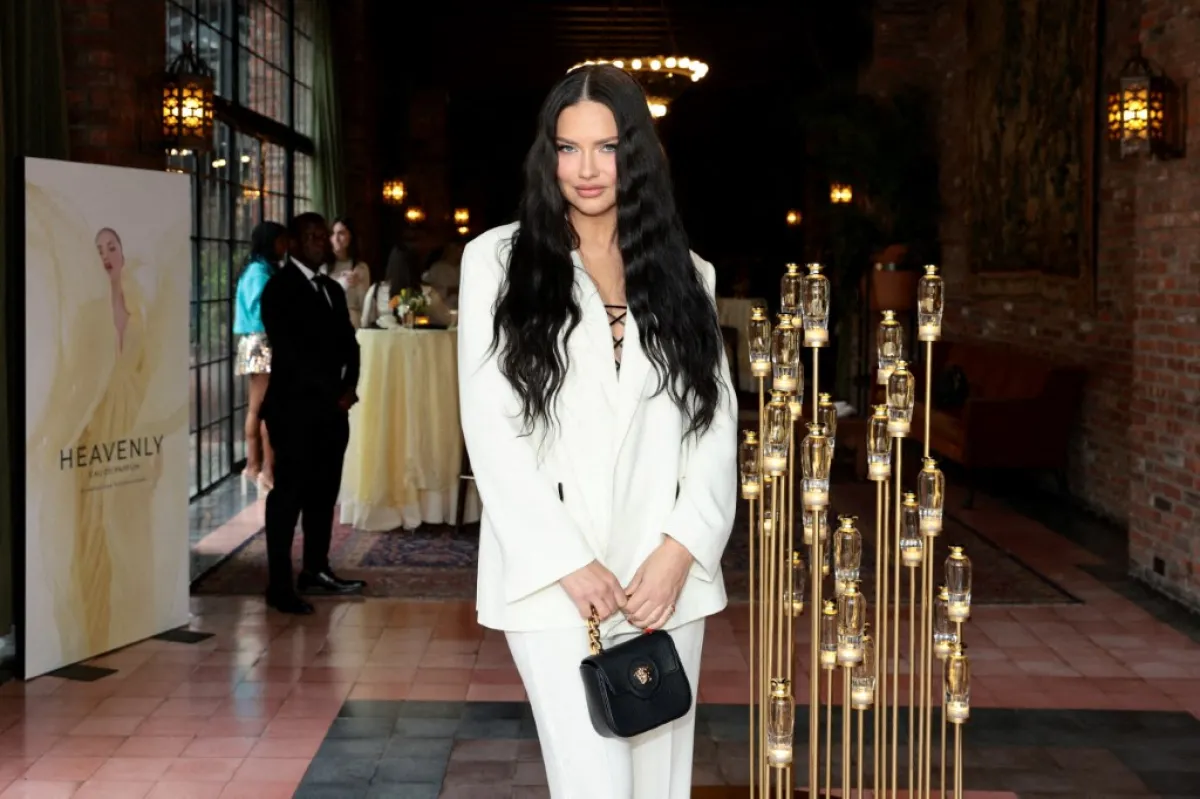  أدريانا ليما Adriana Lima - (مصدر الصورة: Dimitrios Kambouris/Getty Images for Victoria's Secret/AFP )  