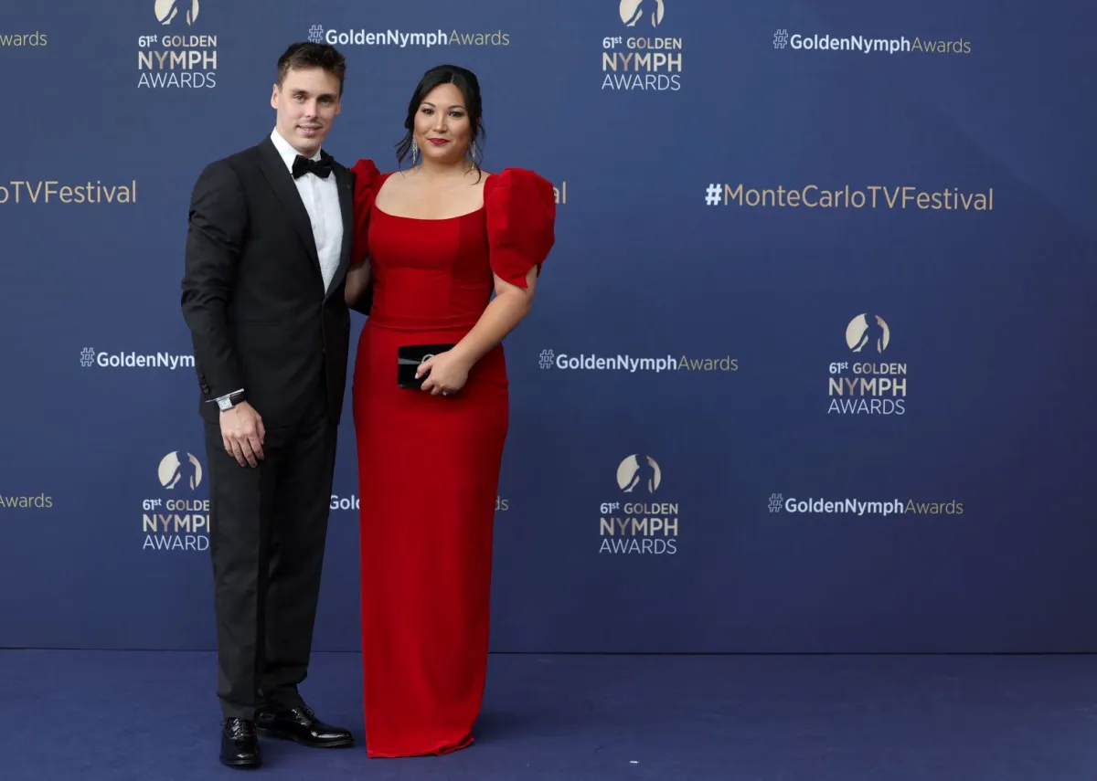 ابن الأميرة ستيفاني أميرة موناكو لويس دوكرويت وزوجته ماري دوكرويت في موناكو (Princess Stephanie of Monaco's son Louis Ducruet and wife Marie Ducruet in Monaco). مصدر الصورة: Valery HACHE / AFP