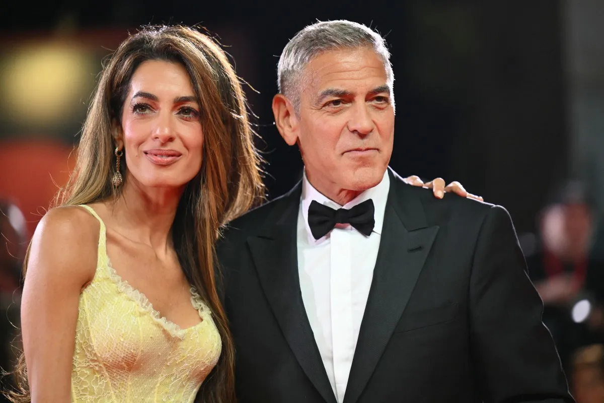 أمل وجورج كلوني George and Amal Clooney في مهرجان فينيسيا السينمائي (Alberto PIZZOLI / AFP)