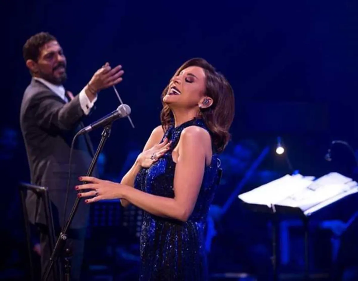 المايسترو هاني فرحات والمُطربة أنغام - الصورة من المكتب الإعلامي لـ هاني فرحات